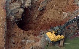 USA: Large sinkhole just behind the pitch