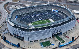 Fans go through metal detectors at Yankee Stadium