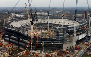 London: First tiles decorate Tottenham stadium's facade