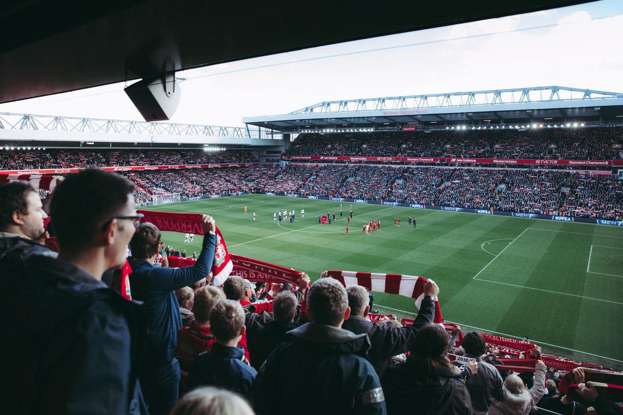 fans watching football game at Anfield