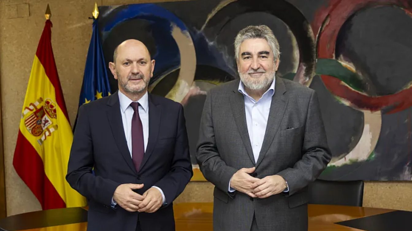 In the picture, they discuss preparations for the World Cup during a meeting on 24 February.