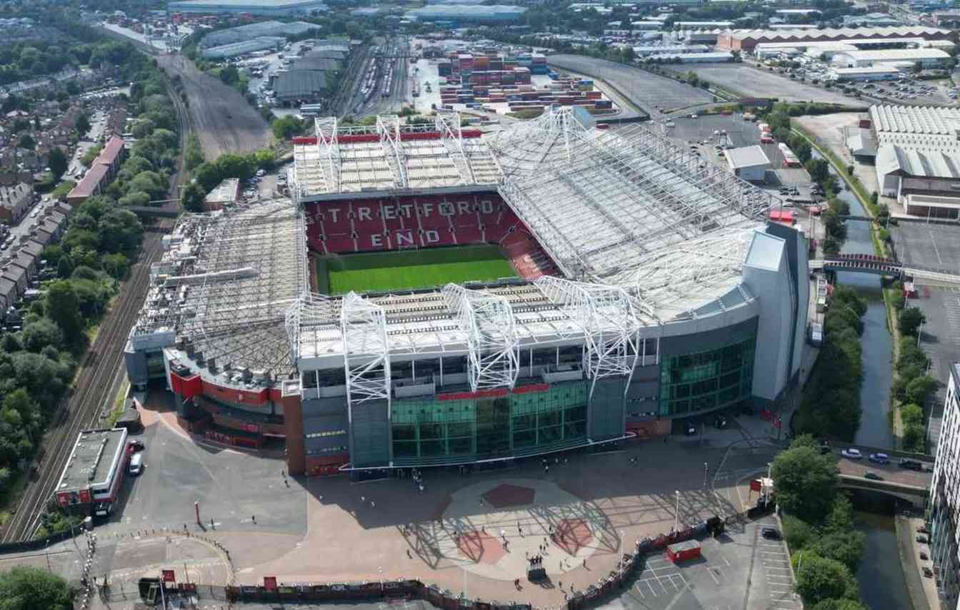 Manchester United is implementing short-term upgrades at Old Trafford, including new food outlets, self-service kiosks, and digital fan communication systems.