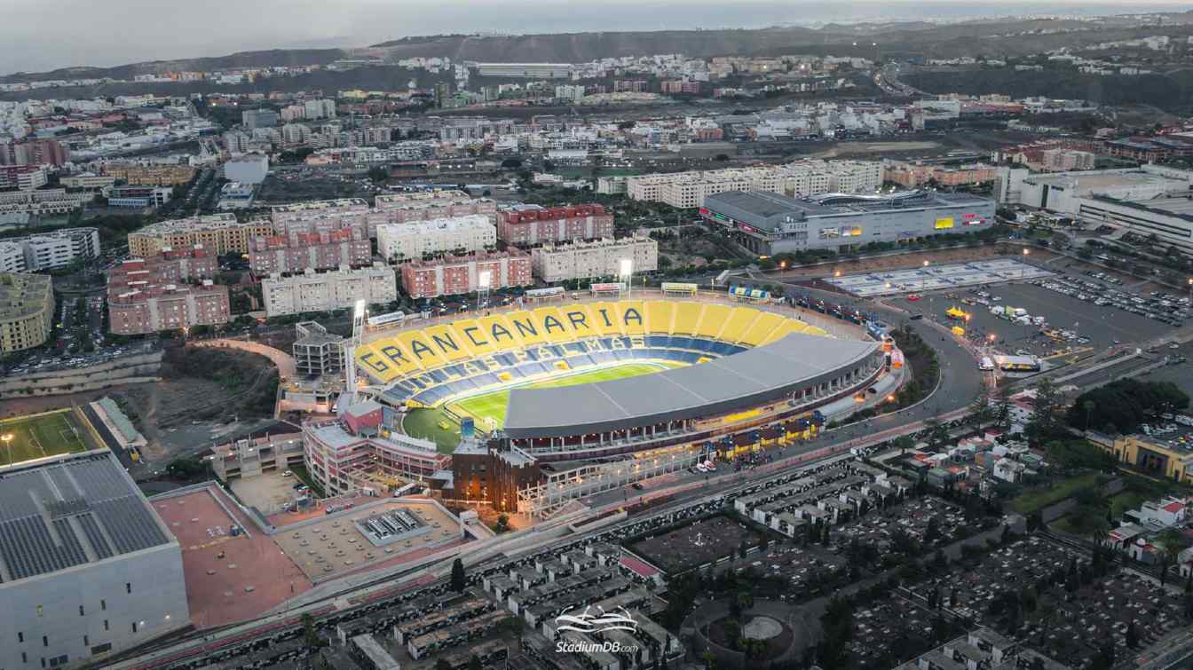 The east tower, visible next to the floodlight on the left, is being demolished to make way for the future stadium structure.